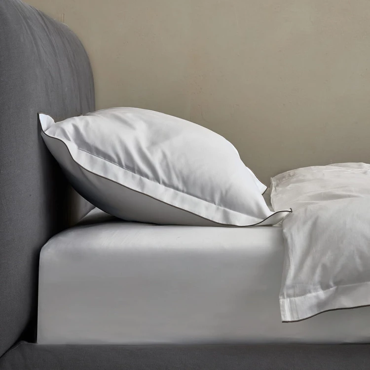 classic satin_fitted sheet_on bed.jpg
