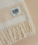Koc-kremowy-z-fredzlami-2.jpg.webp